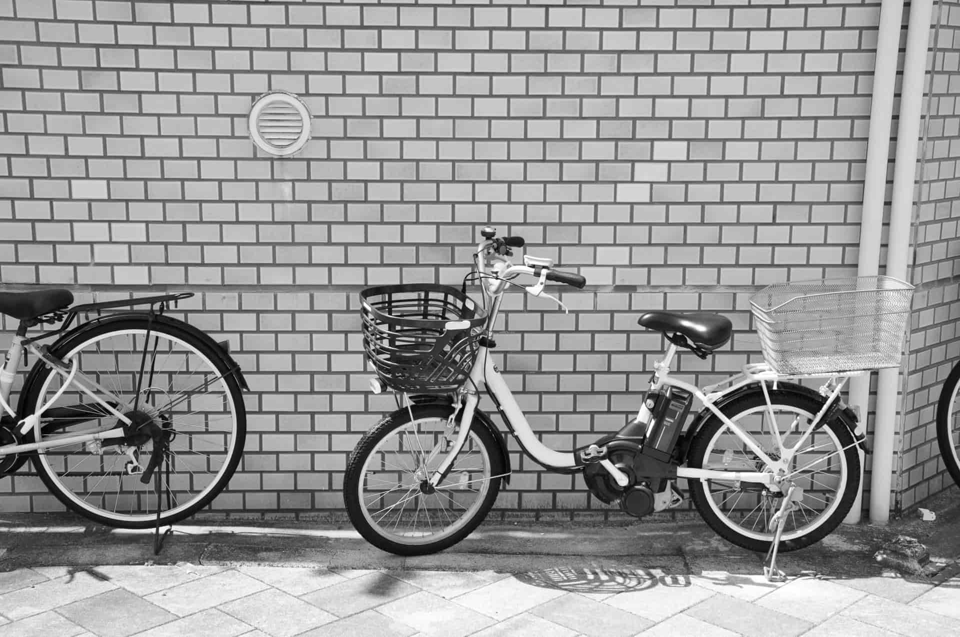 An electric bike parked on a sunny urban bike lane