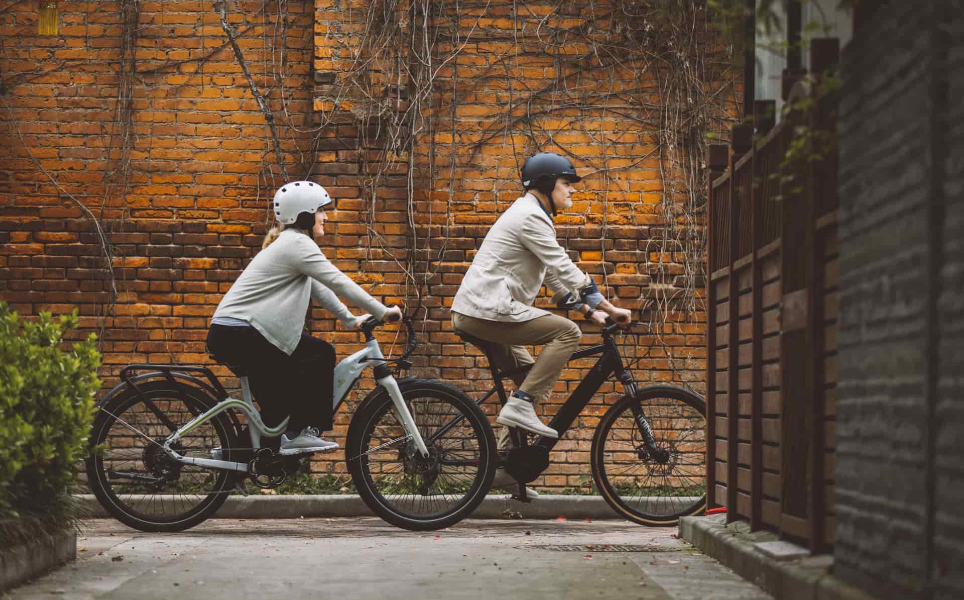 A rider on a commuter electric bike on a city street